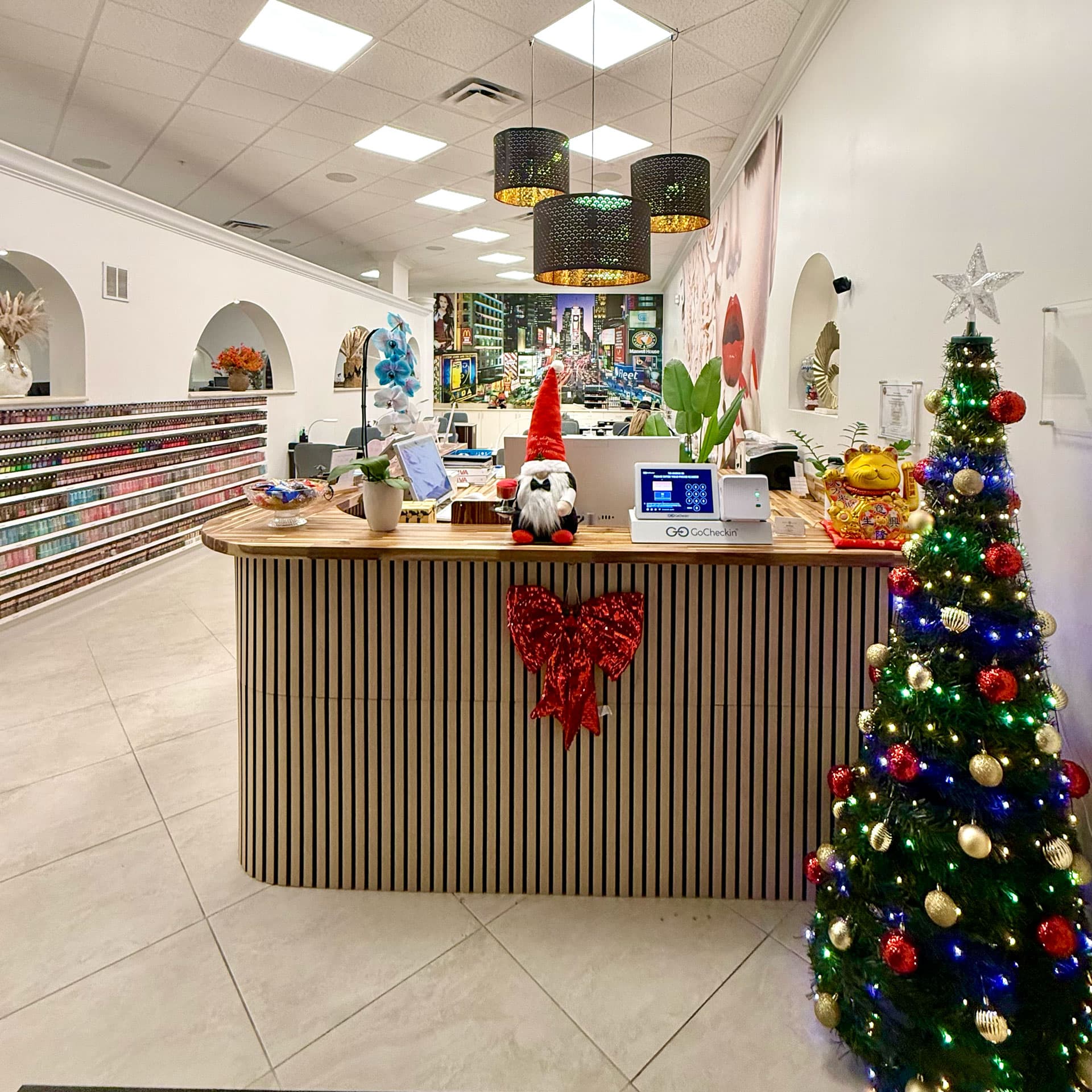 Lumé Nail Bar reception desk with warm lighting